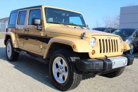 2013 Jeep Wrangler Unlimited for sale at SHAFER AUTO GROUP INC in Columbus OH
