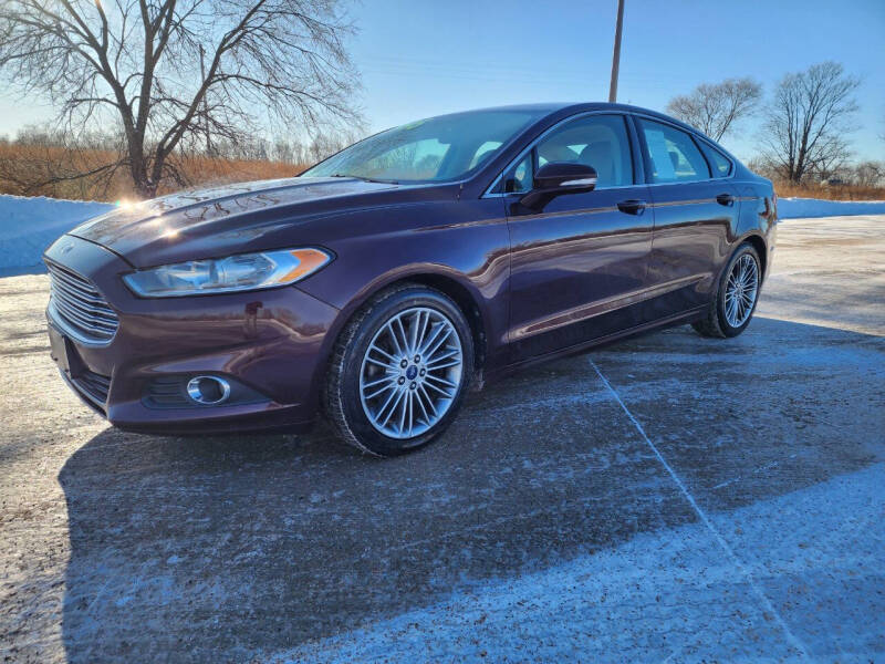 2013 Ford Fusion for sale at MAD MOTORS LLC in Saint Cloud MN