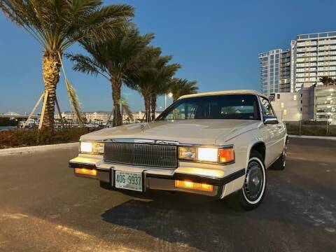 1985 Cadillac DeVille for sale at CARuso Classics in Tampa FL