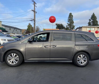 2015 Honda Odyssey for sale at La Mesa Auto Sales in Huntington Park CA