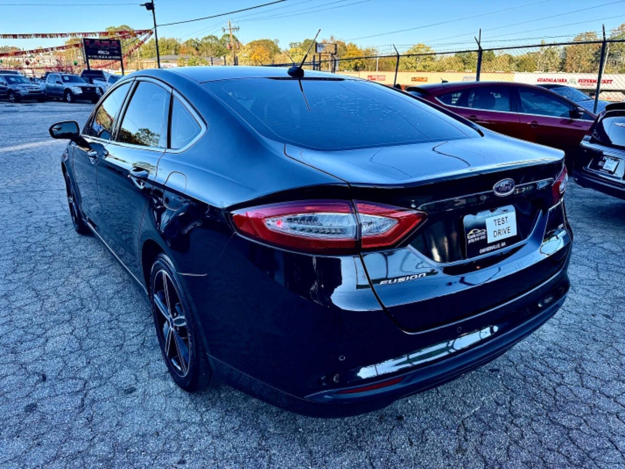 2015 Ford Fusion for sale at ICars Motors LLC in Gainesville, GA