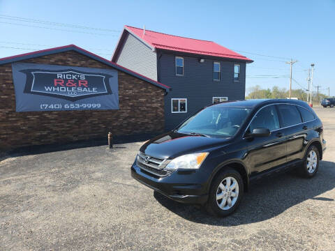2011 Honda CR-V for sale at Rick's R & R Wholesale, LLC in Lancaster OH