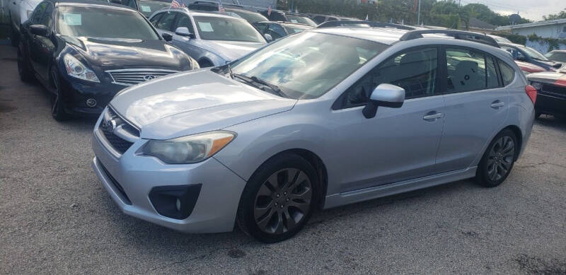 2014 Subaru Impreza for sale at INTERNATIONAL AUTO BROKERS INC in Hollywood FL