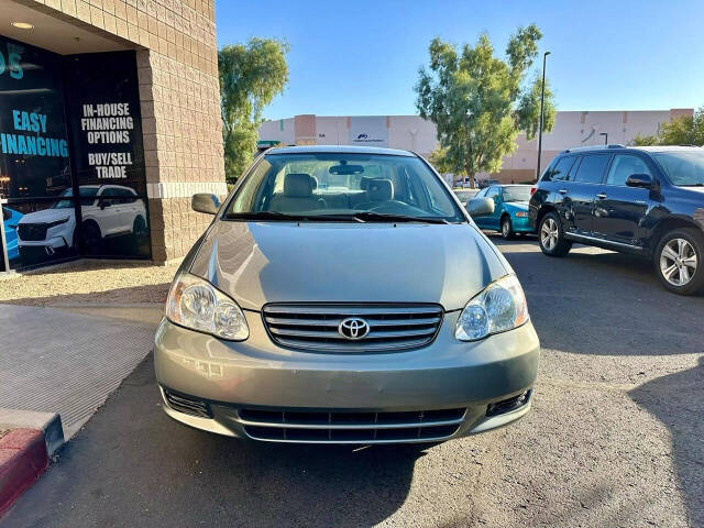 2003 Toyota Corolla for sale at HUDSONS AUTOS in Gilbert, AZ