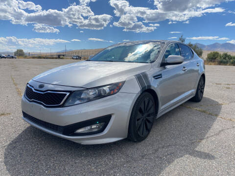 2012 Kia Optima for sale at BELOW BOOK AUTO SALES in Idaho Falls ID