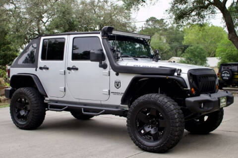 2011 Jeep Wrangler Unlimited for sale at SELECT JEEPS INC in League City TX