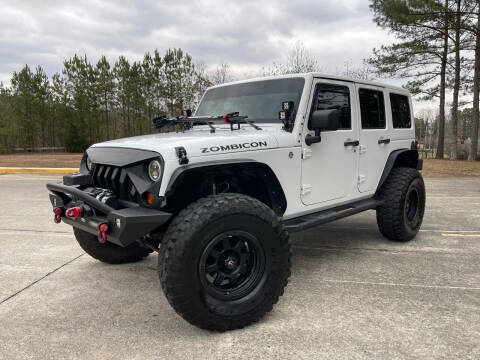 2012 Jeep Wrangler Unlimited for sale at SELECTIVE IMPORTS in Woodstock GA