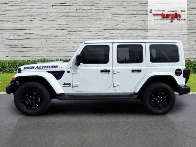 Used 2023 Jeep Wrangler 4-Door Sahara Altitude with VIN 1C4HJXEG6PW700983 for sale in Dubuque, IA
