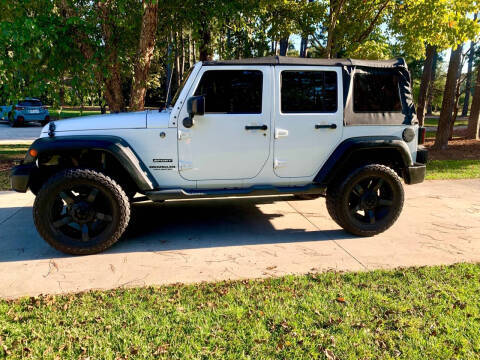 2014 Jeep Wrangler Unlimited for sale at Poole Automotive in Laurinburg NC