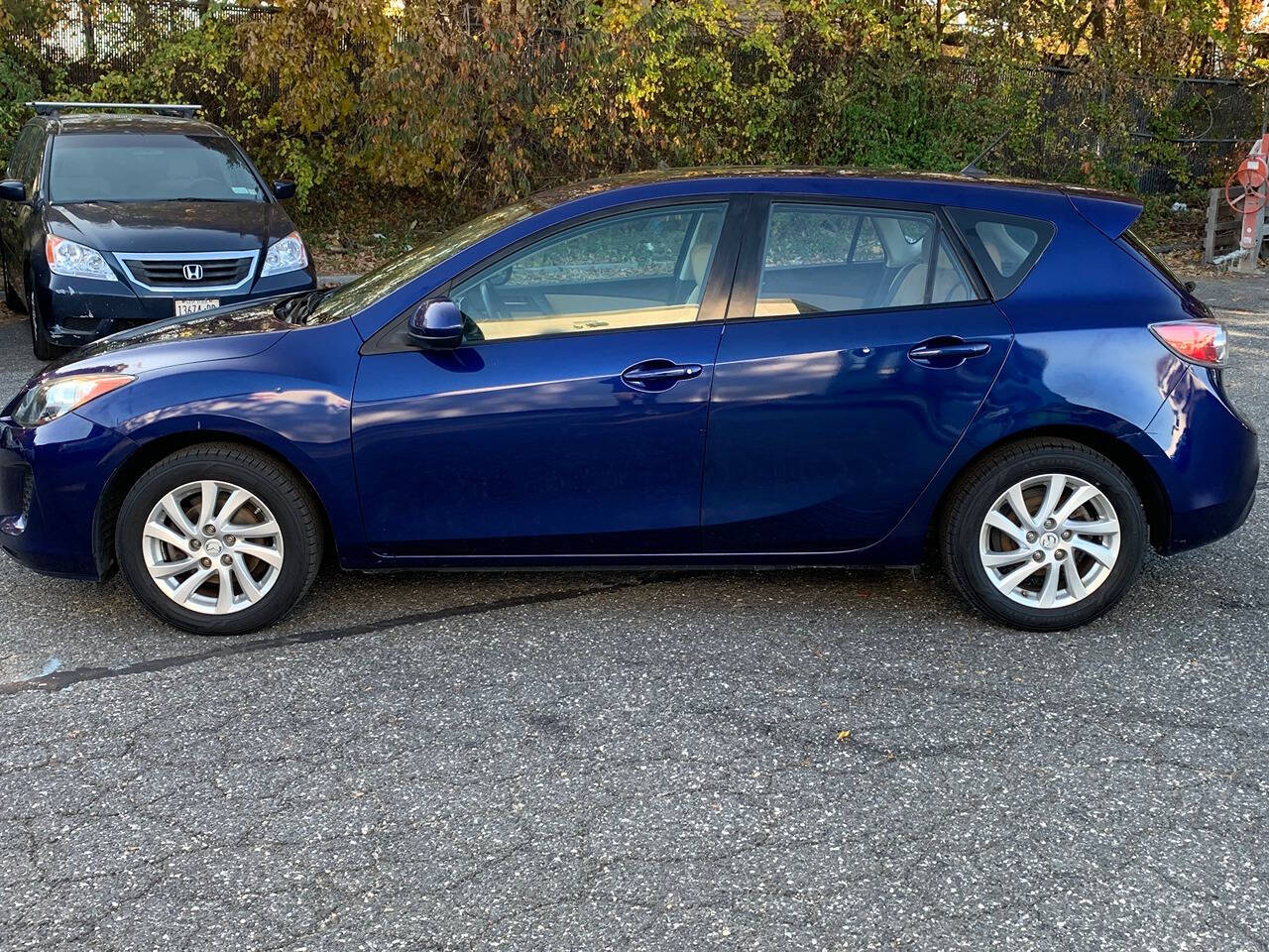 2012 Mazda Mazda3 for sale at Avilor Auto Terminal inc. in Central Islip, NY