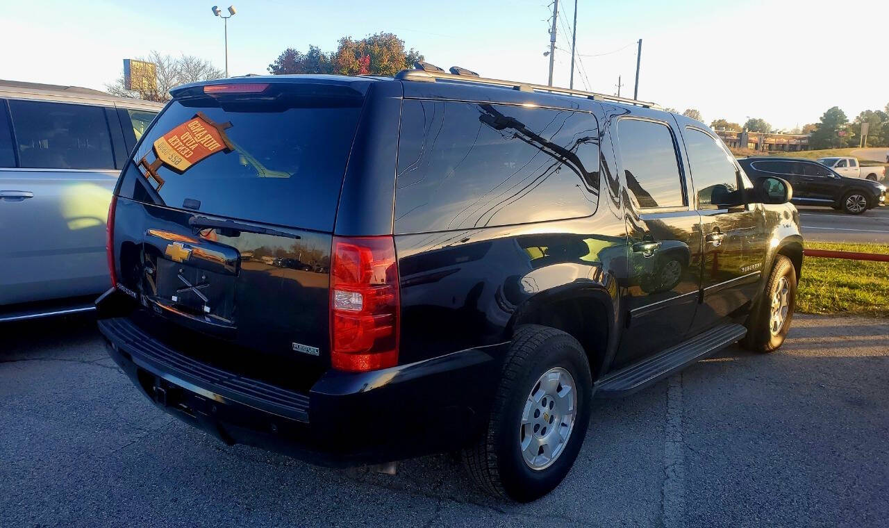 2012 Chevrolet Suburban for sale at DURANGO AUTO CENTER LLC in Tulsa, OK