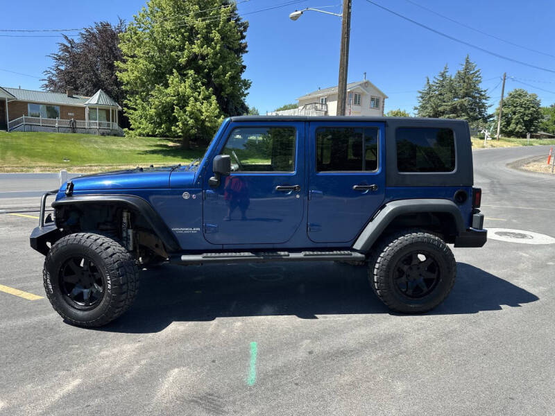 Used 2009 Jeep Wrangler Unlimited Rubicon with VIN 1J8GA69109L755566 for sale in Salem, UT