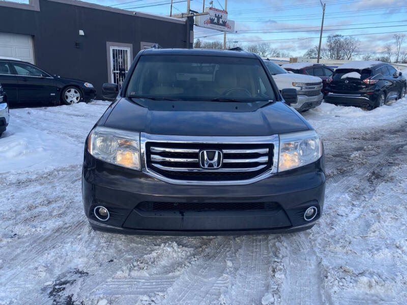 2012 Honda Pilot for sale at Castle Cars Inc. in Lansing MI