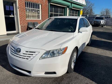 2009 Toyota Camry for sale at American Best Auto Sales in Uniondale NY