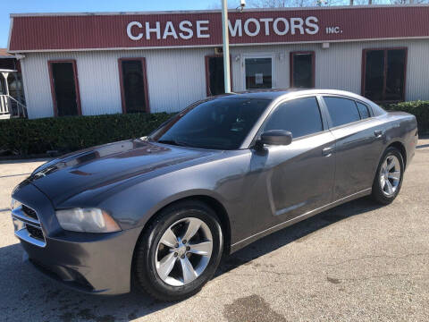 2013 Dodge Charger for sale at Chase Motors Inc in Stafford TX