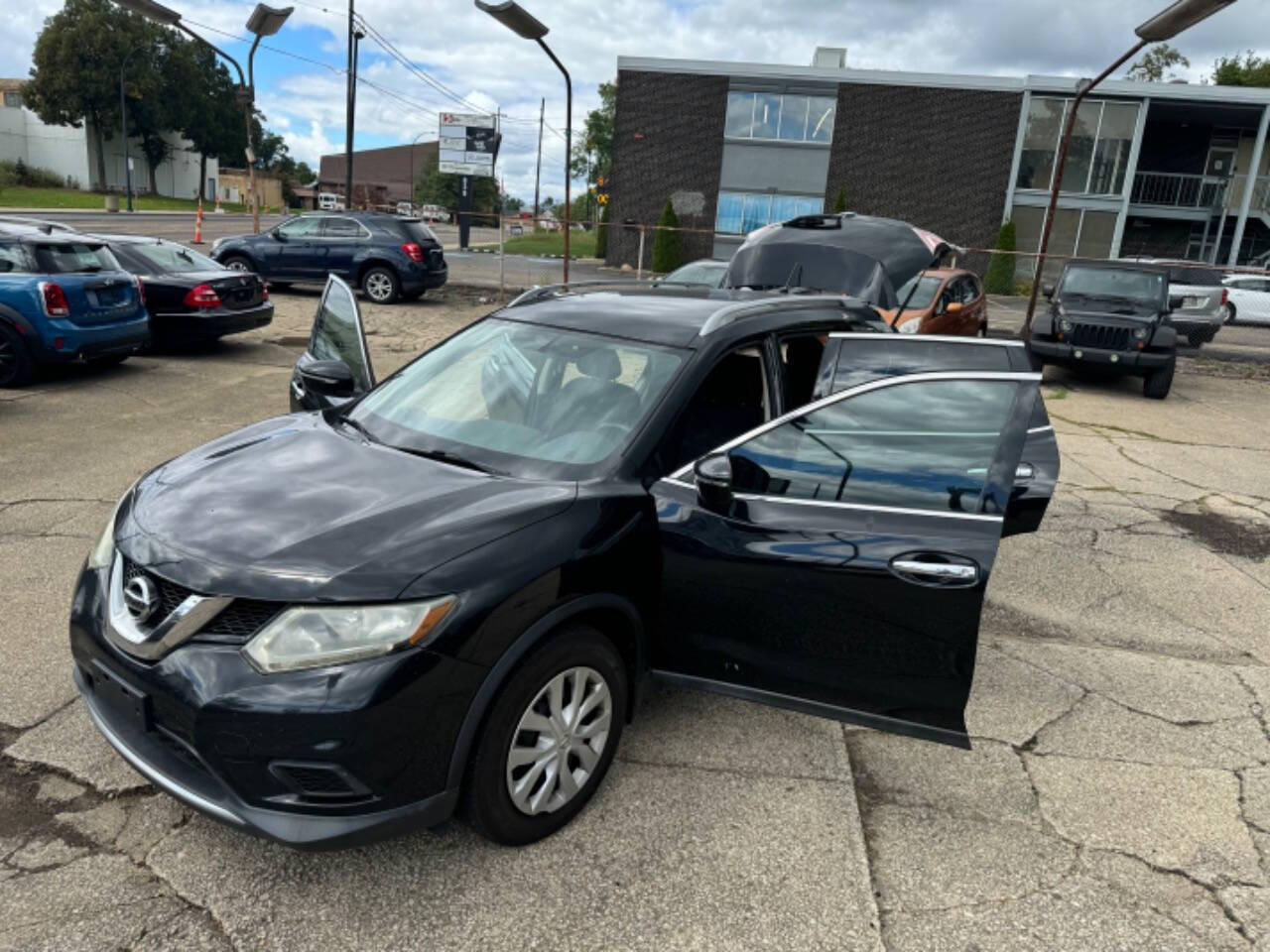 2015 Nissan Rogue for sale at First Class Auto Mall in Akron, OH