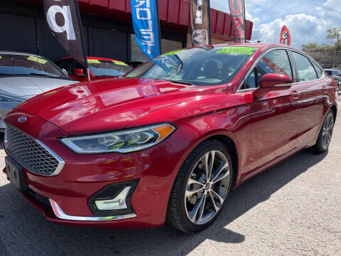2019 Ford Fusion for sale at Duke City Auto LLC in Gallup NM