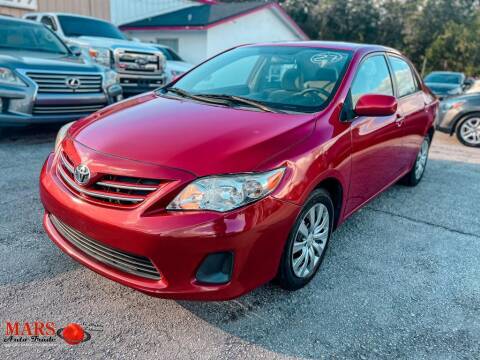 2013 Toyota Corolla for sale at Mars Auto Trade LLC in Orlando FL