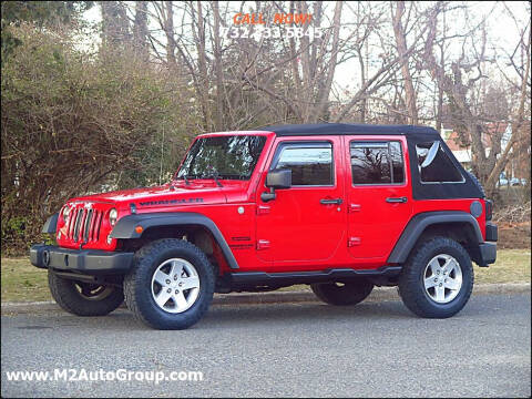 2014 Jeep Wrangler Unlimited for sale at M2 Auto Group Llc. EAST BRUNSWICK in East Brunswick NJ