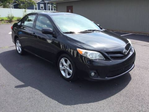 2012 Toyota Corolla for sale at International Motor Group LLC in Hasbrouck Heights NJ