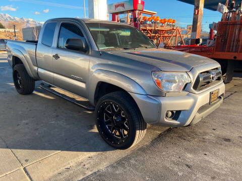 2015 Toyota Tacoma for sale at BELOW BOOK AUTO SALES in Idaho Falls ID