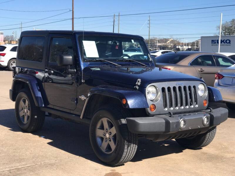 2013 Jeep Wrangler for sale at Discount Auto Company in Houston TX
