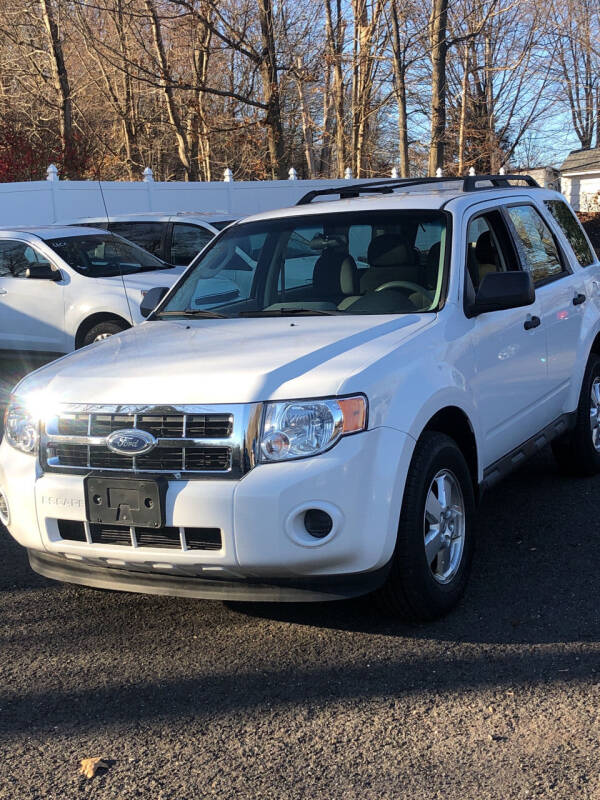 2011 Ford Escape for sale at The Used Car Company LLC in Prospect CT