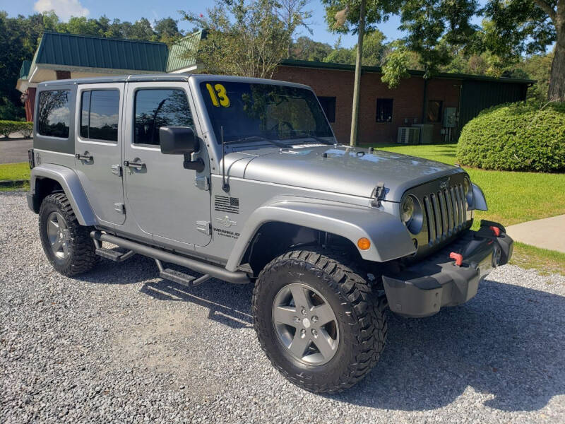 2013 Jeep Wrangler Unlimited for sale at Darwin Harris Automotive in Fairhope AL