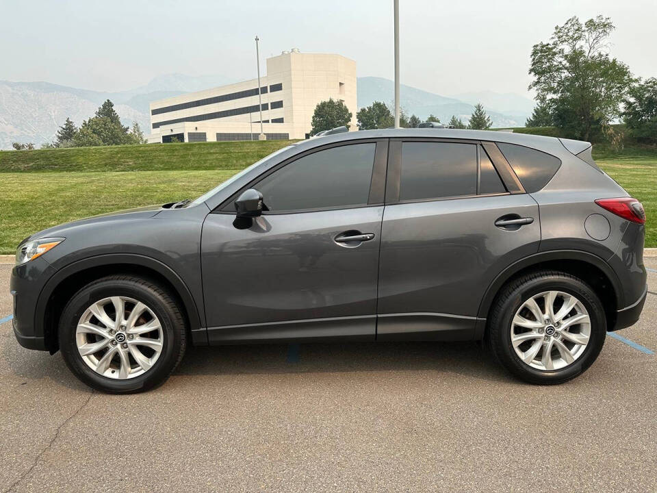 2014 Mazda CX-5 for sale at DRIVE N BUY AUTO SALES in OGDEN, UT