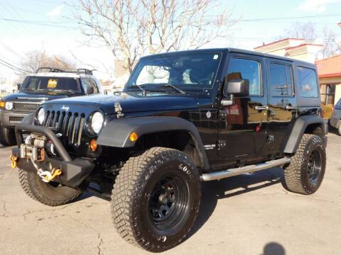 2012 Jeep Wrangler Unlimited for sale at Delaware Auto Sales in Delaware OH