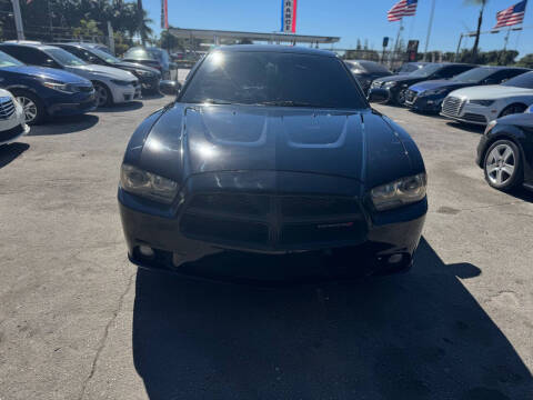 2014 Dodge Charger for sale at America Auto Wholesale Inc in Miami FL