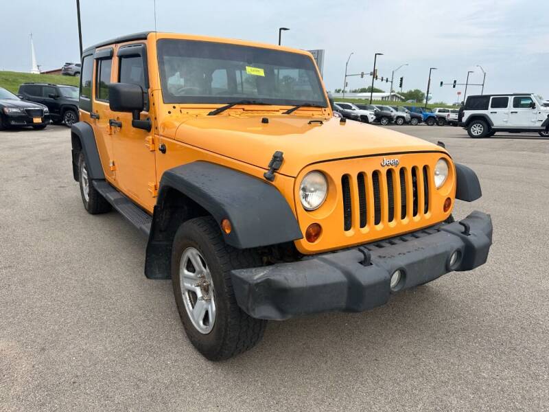 2013 Jeep Wrangler Unlimited for sale at Postal Pete in Galena IL