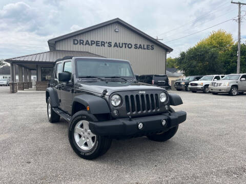 2014 Jeep Wrangler Unlimited for sale at Drapers Auto Sales in Peru IN