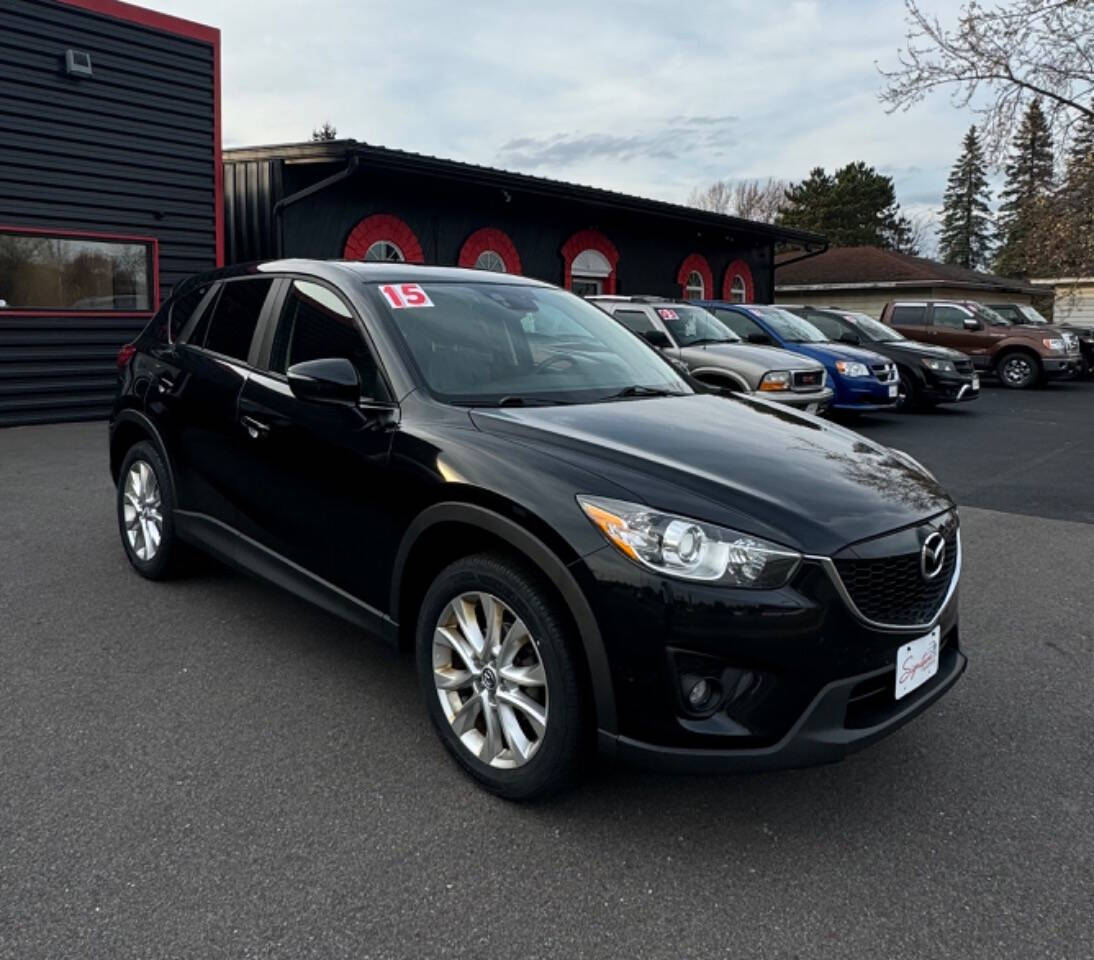 2015 Mazda CX-5 for sale at SIGNATURE AUTOS LLC in Weston, WI