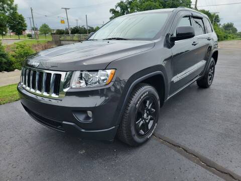 2011 Jeep Grand Cherokee for sale at GLASS CITY AUTO CENTER in Lancaster OH