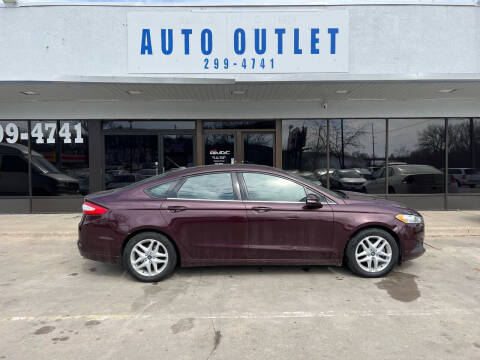 2013 Ford Fusion for sale at Auto Outlet in Des Moines IA