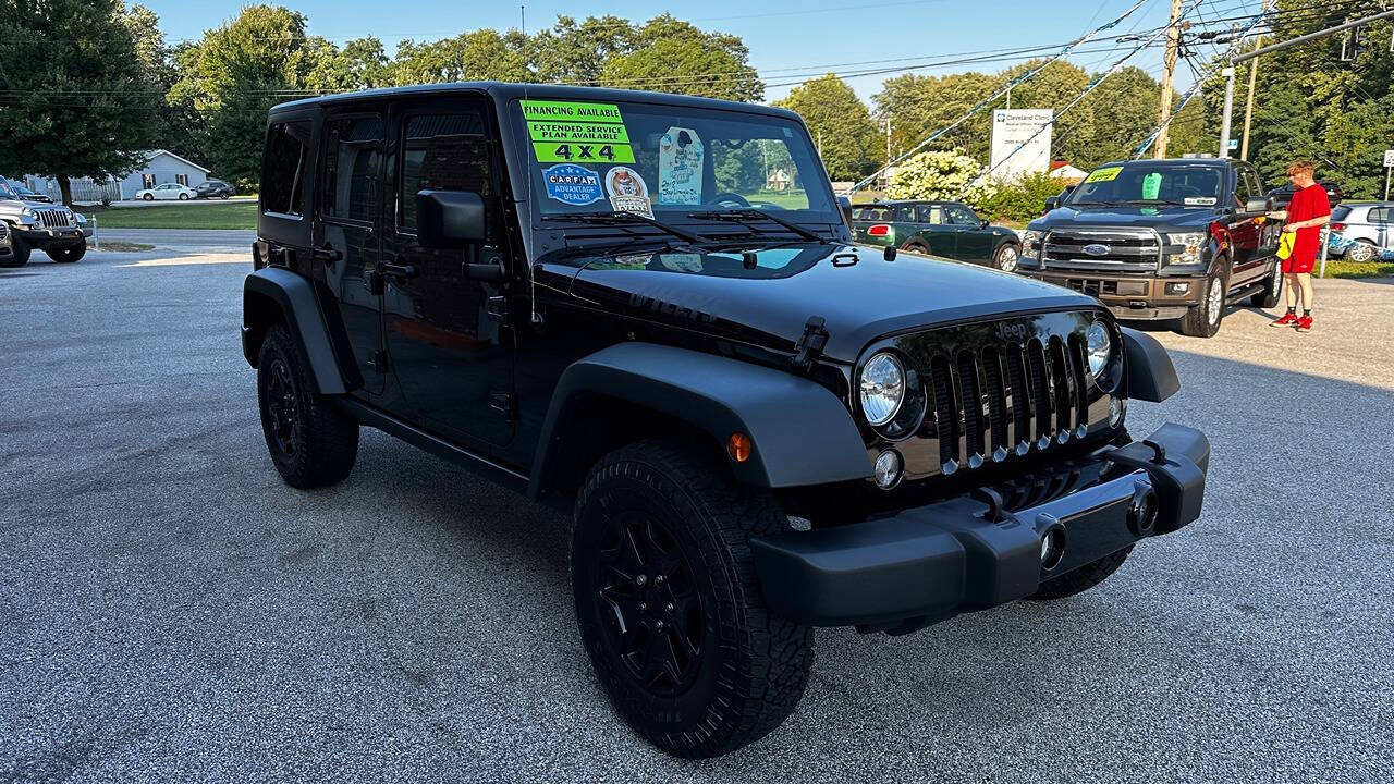 2018 Jeep Wrangler JK Unlimited for sale at North Ridge Auto Center LLC in Madison, OH