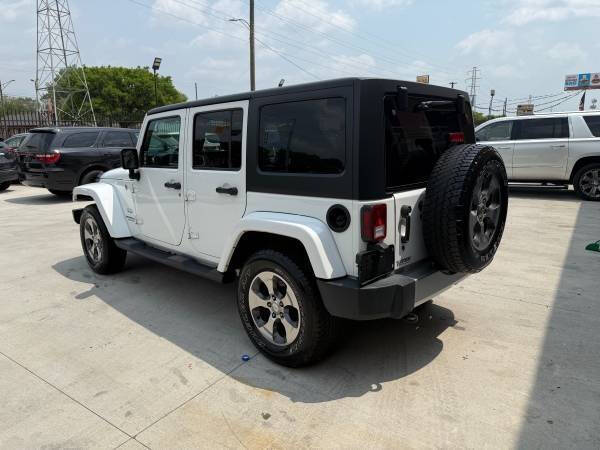 Used 2017 Jeep Wrangler Unlimited Sahara with VIN 1C4HJWEG5HL516311 for sale in Detroit, MI