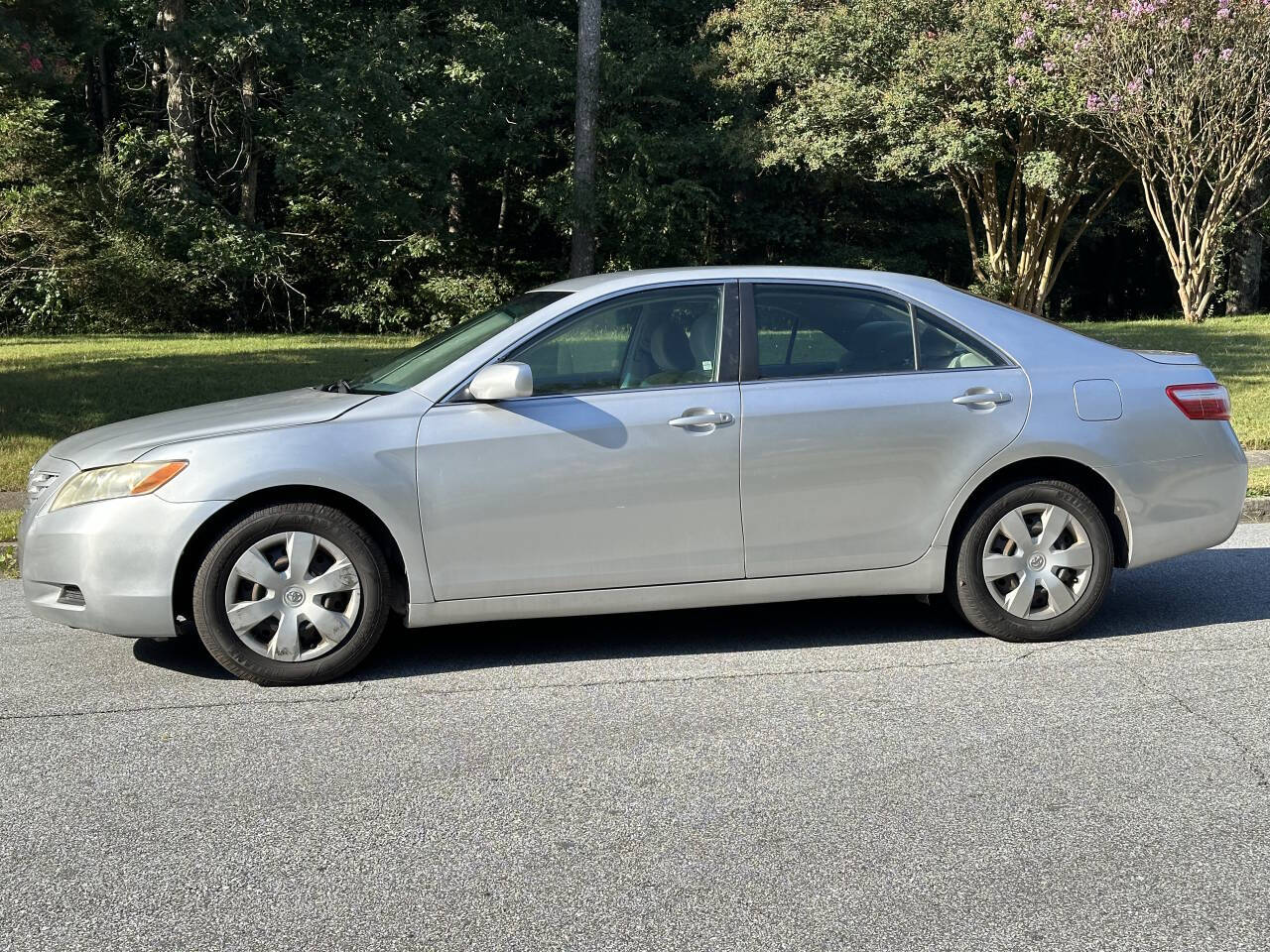 2009 Toyota Camry for sale at SHURE AUTO SALES in Snellville, GA