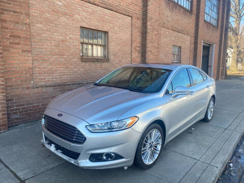 2014 Ford Fusion for sale at Domestic Travels Auto Sales in Cleveland OH