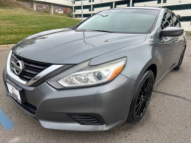 2016 Nissan Altima for sale at DRIVE N BUY AUTO SALES in OGDEN, UT