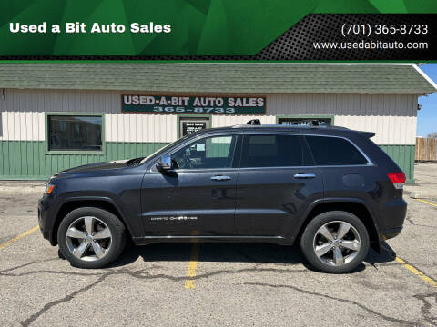 2014 Jeep Grand Cherokee for sale at Used a Bit Auto Sales in Fargo ND