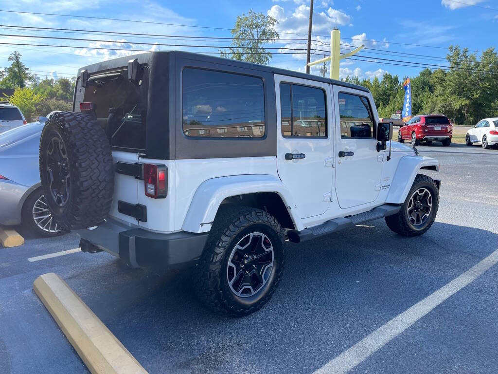 2012 Jeep Wrangler Unlimited for sale at INTEGRITY AUTO in Dothan, AL