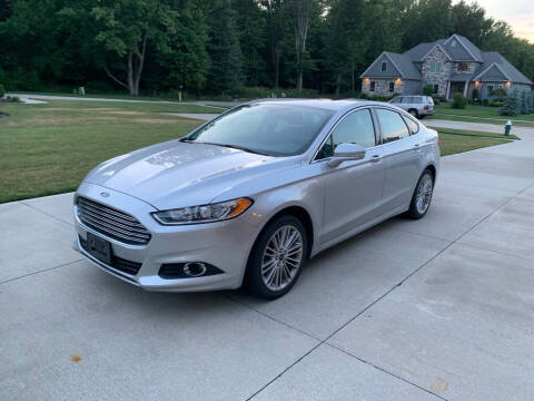 2015 Ford Fusion for sale at EZ AUTO GROUP in Cleveland OH