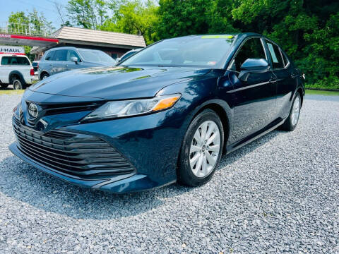 2018 Toyota Camry for sale at Booher Motor Company in Marion VA