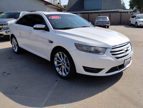 2013 Ford Taurus for sale at Triangle Auto Sales in Omaha NE