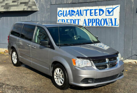 2014 Dodge Grand Caravan for sale at Heely's Autos in Lexington MI