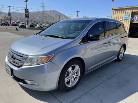 2013 Honda Odyssey for sale at Los Compadres Auto Sales in Riverside CA
