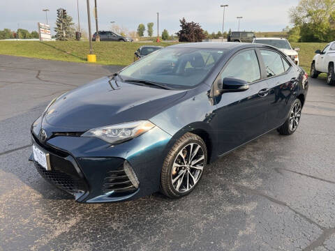 2018 Toyota Corolla for sale at NEUVILLE CHEVY BUICK GMC in Waupaca WI