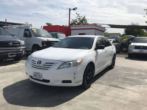 2009 Toyota Camry for sale at Auto Emporium in Wilmington CA